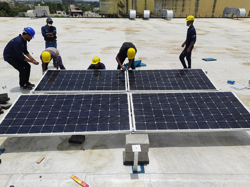 Aerial view of a commissioned industrial solar park in Gujarat